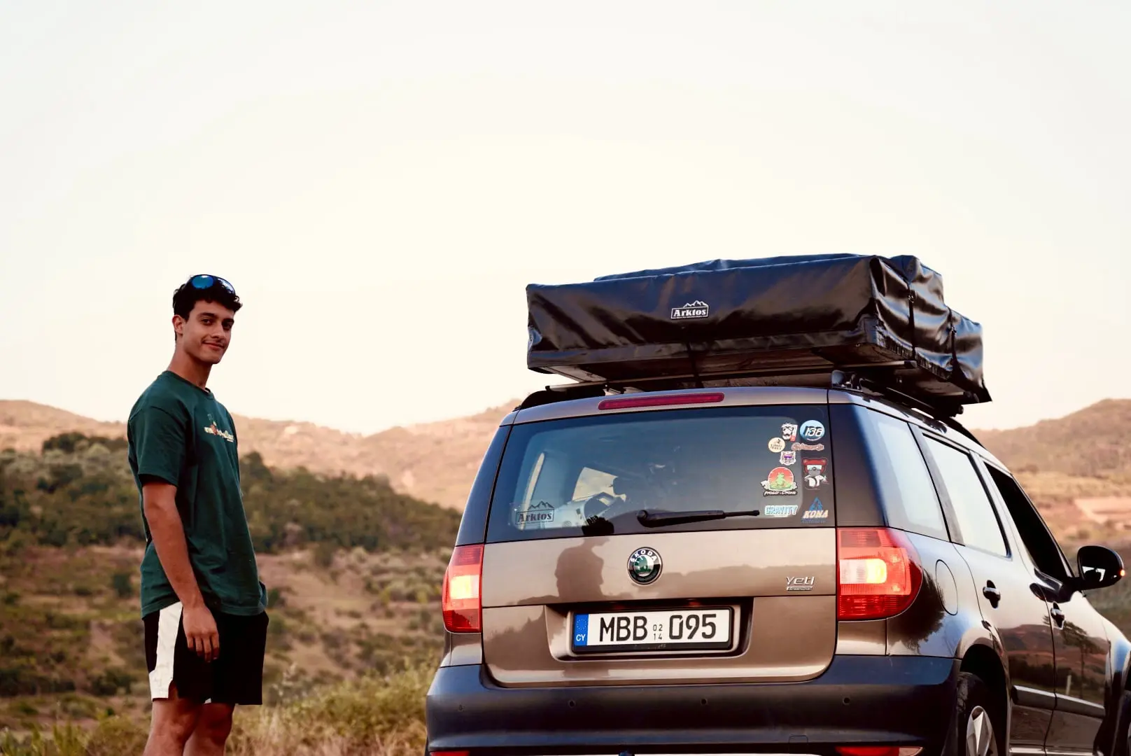 George Kouzis standing next to a Skoda Car